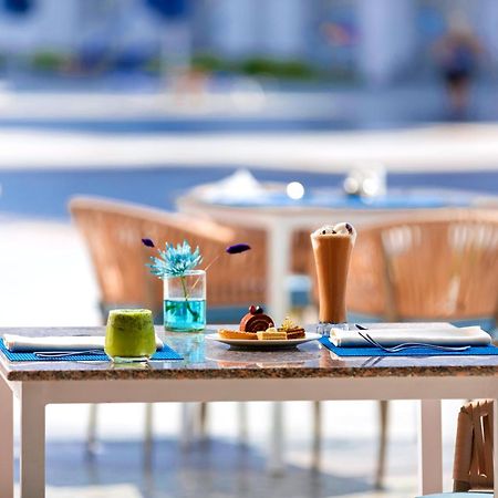 Pickalbatros Blu Spa Resort - Adults Friendly 16 Years Plus- Ultra All-Inclusive الغردقة المظهر الخارجي الصورة A table at a restaurant